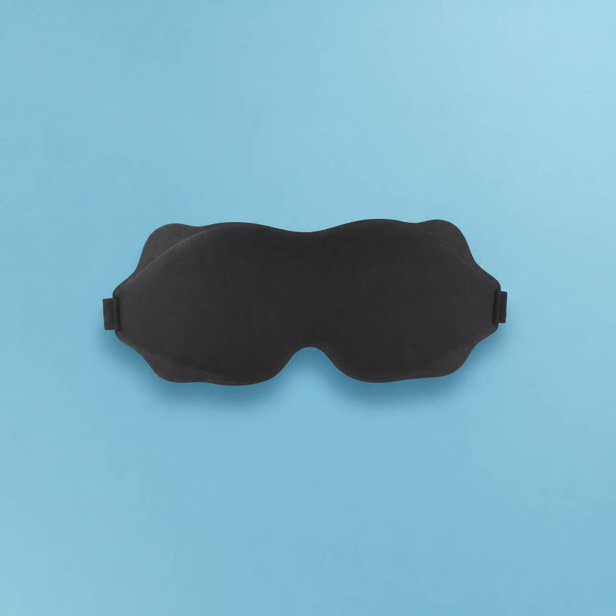 MigraineMend Migraine Relief Mask close-up showing contoured light-blocking design