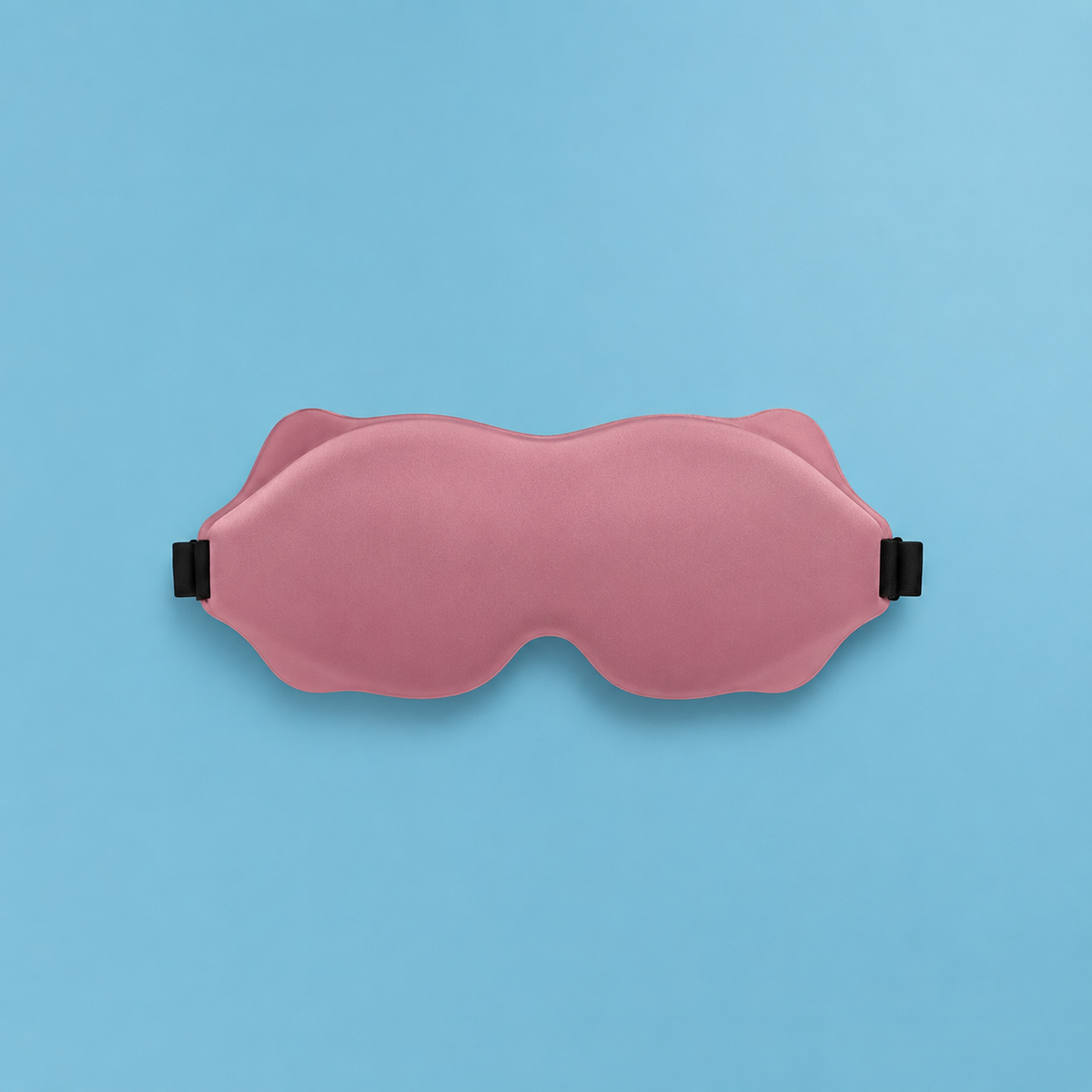 MigraineMend blackout eye mask worn for daytime nap, full light coverage