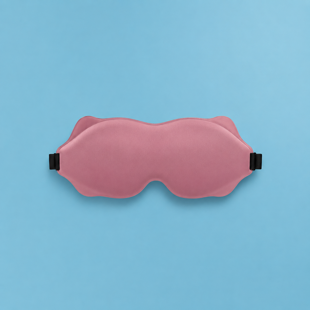 MigraineMend Migraine Relief Mask worn for daytime nap, full light coverage